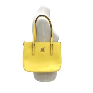 Anne Klein yellow shoulder bag with top zipper closure